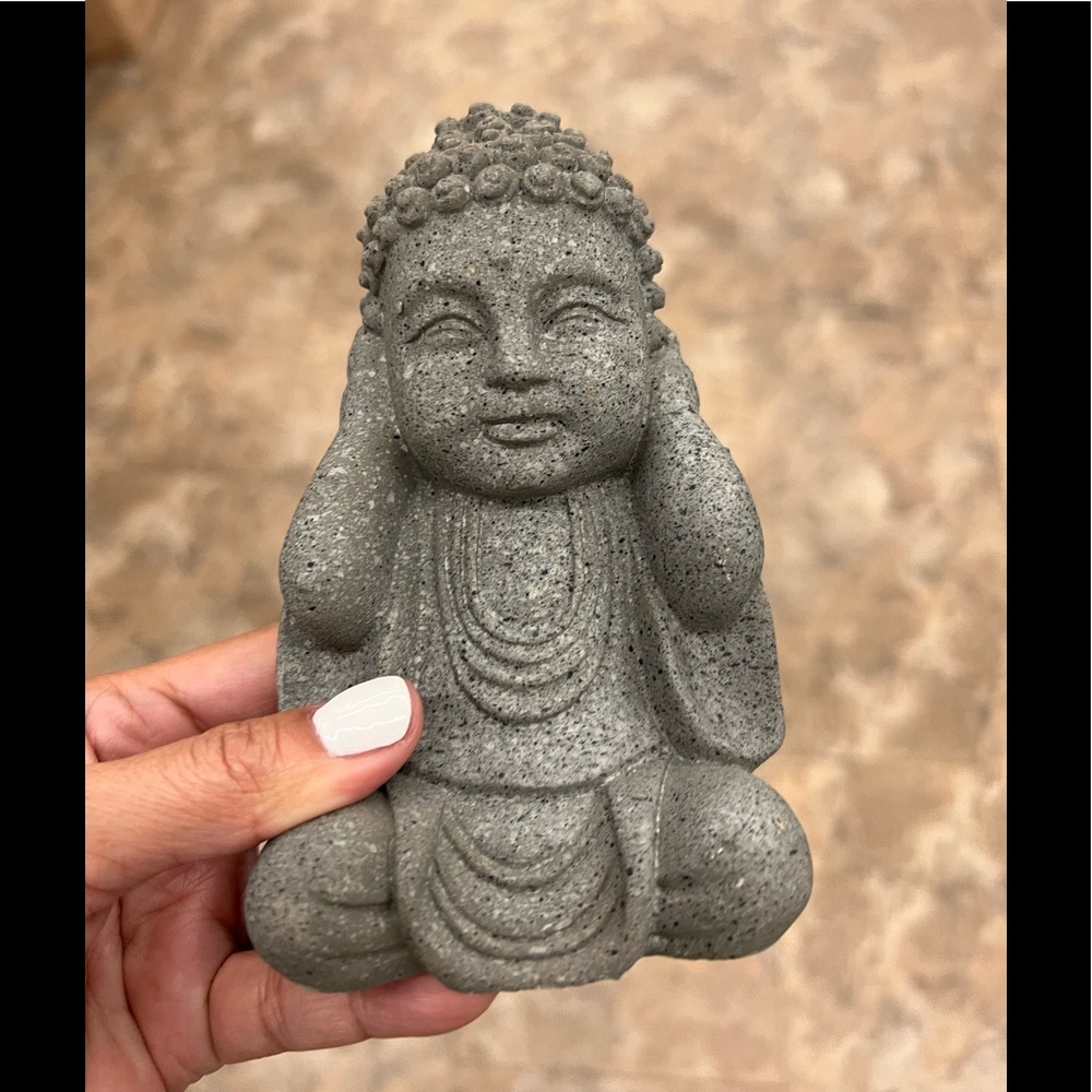 Hear no evil stone statue